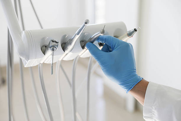 Professional Tooth Extraction technician working in USA